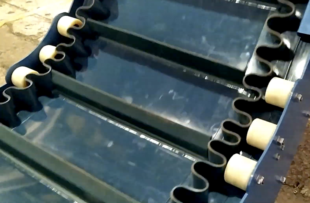 guiding rollers for a corrugated belt